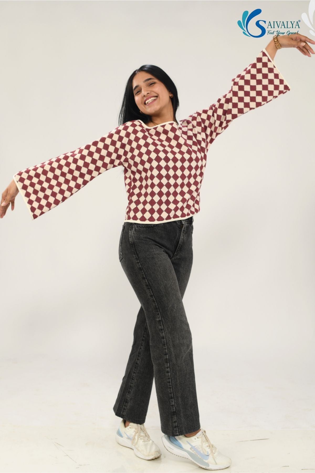 Front and back view of Shatranj Maroon Bell Top featuring a maroon and cream harlequin pattern, dramatic flared bell sleeves, and a boat neck in textured organic fabric