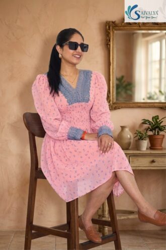 Front and back view of the Pink Floral Smocked Dress featuring an intricate blue lace V-neck, puffed sleeves with lace cuffs, and a flattering smocked waist in lightweight jeorjjet fabric